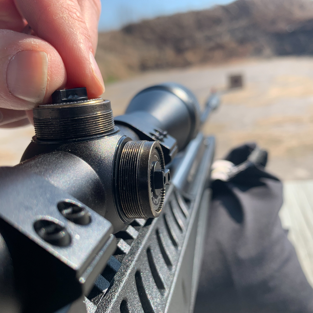 Ruger Air Rifle with scope caps off on a shooting bench